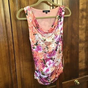 Woman’s sleeveless blouse, size MP, draped neck and hem, lined, stretch